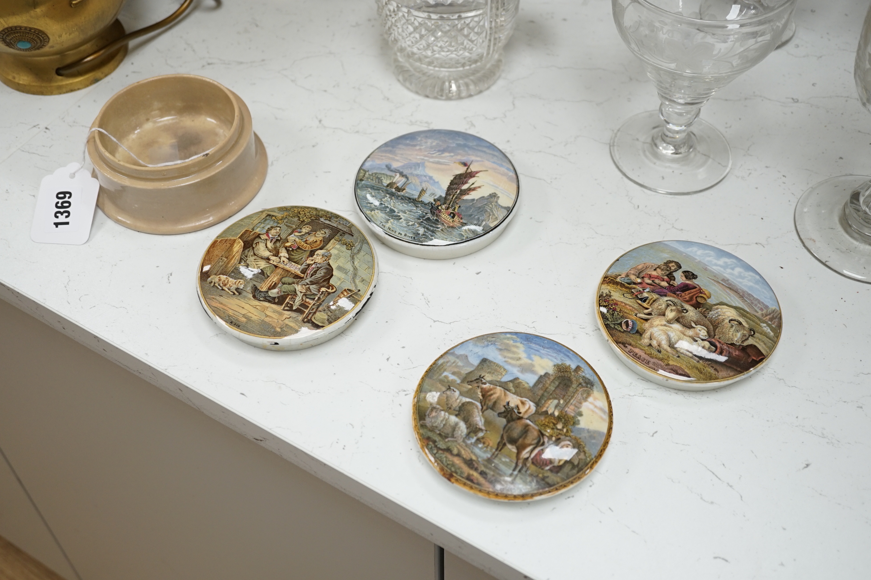 Nine Victorian ceramic Prattware pot lids and one base